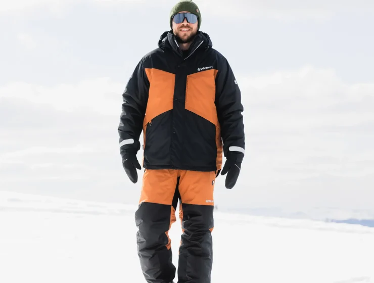 Man wearing rented winter overalls in rovaniemi